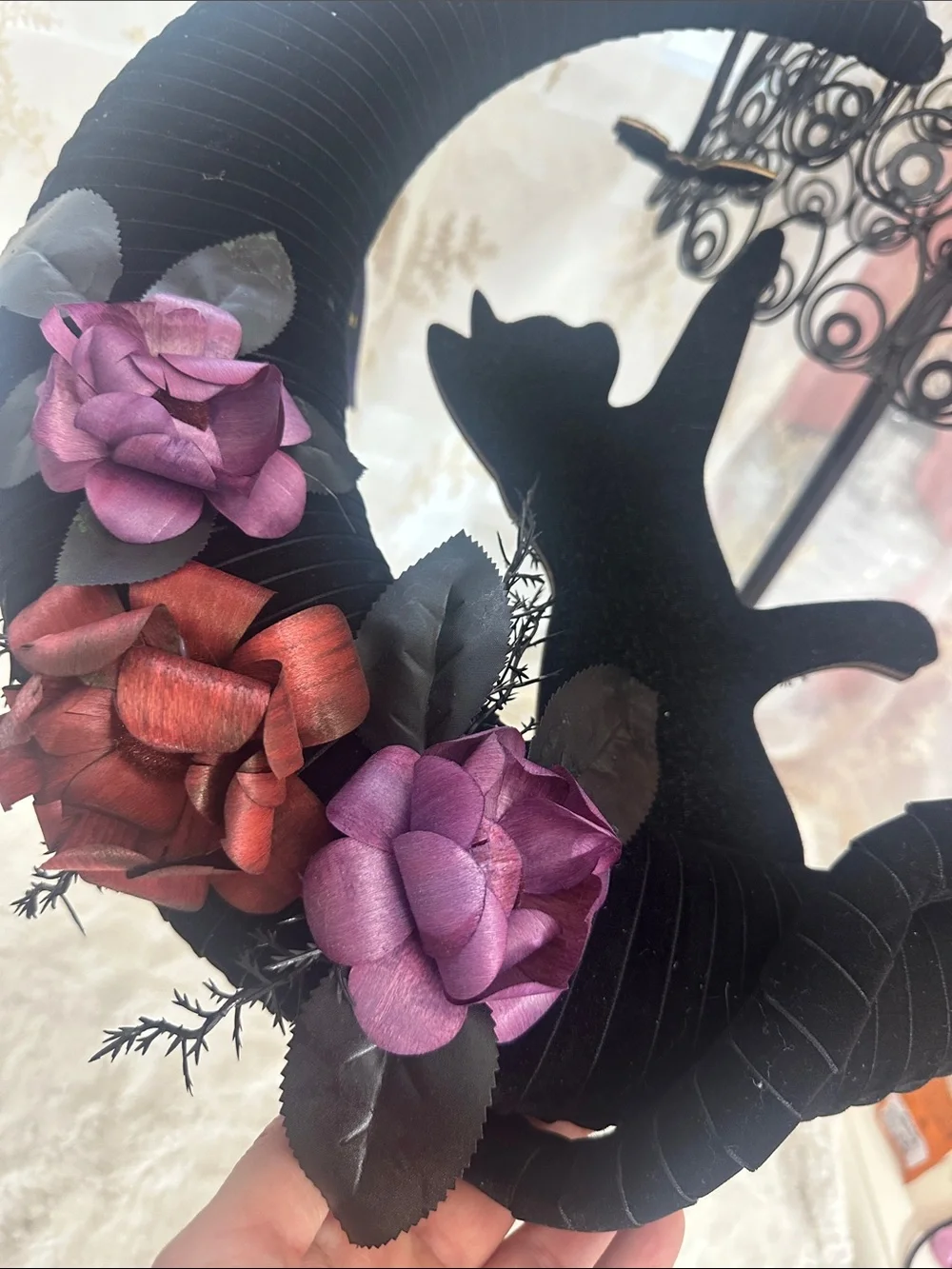 Moonlight Manor crescent moon wreath features a black cat silhouette
